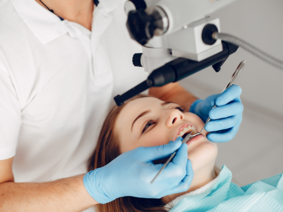 beautiful-girl-sitting-dentist-s-office 1